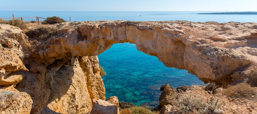 Natural limestone sea arch on the Agioi Anargyroi–Sea Caves route
